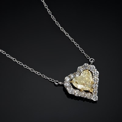 Lot 109 - Graff, a platinum Fancy Yellow diamond and diamond heart-shape necklace