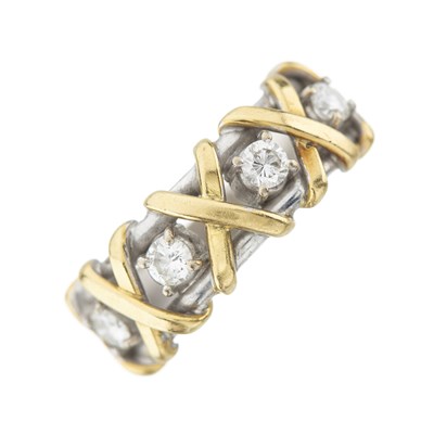 Lot 190 - A bi-colour gold diamond dress ring
