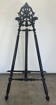 Lot 715 - A late 19th early 20th century ebonised carved...