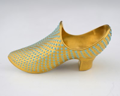 Lot 587 - A Coalport jewelled and gilt toy shoe, of...