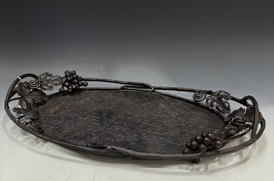 Lot 200 - A French Art Nouveau wrought iron oval tray,...
