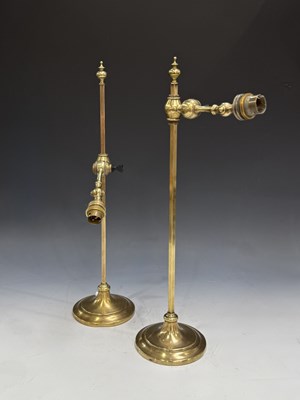 Lot 532 - A pair of late Victorian brass adjustable...