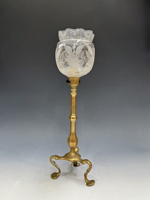 Lot 517 - An English Arts & Crafts brass table lamp, the...
