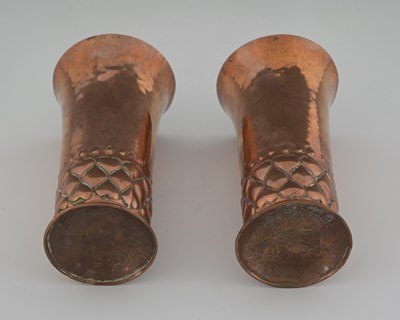 Lot 91 - A pair of Arts and Crafts copper vases, in the...