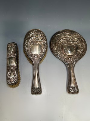 Lot 497 - Two Art Nouveau silver-backed brushes and a...
