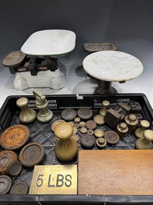 Lot 211 - A complete cased set of Avery brass weights...