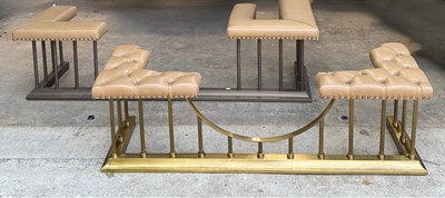 Lot 620 - Two modern leather and brass club fenders, the...