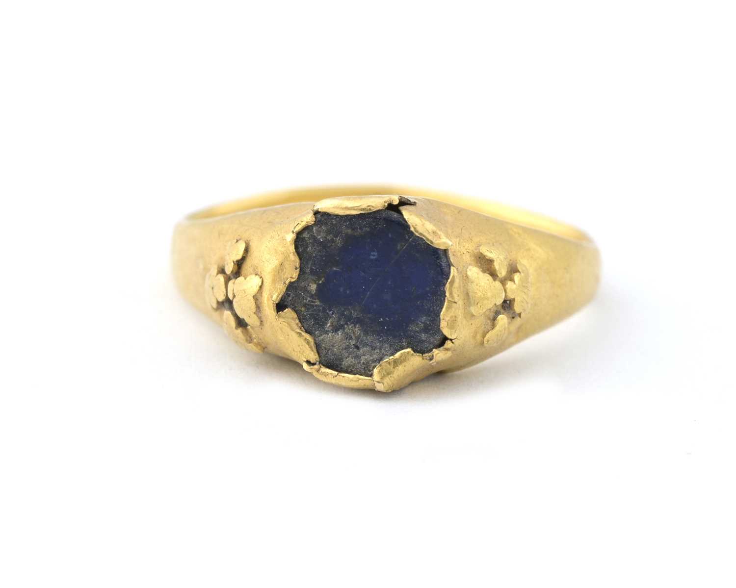 Lot 8 - Byzantine Empire, a medieval gold glass single-stone band ring
