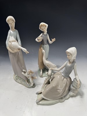 Lot 122A - A Lladro figurine of "Girl With Goose and Dog'...