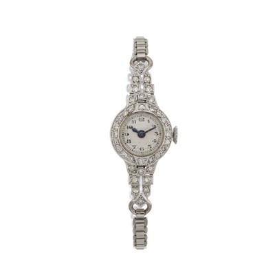 Lot 287 - A white metal diamond set cocktail watch