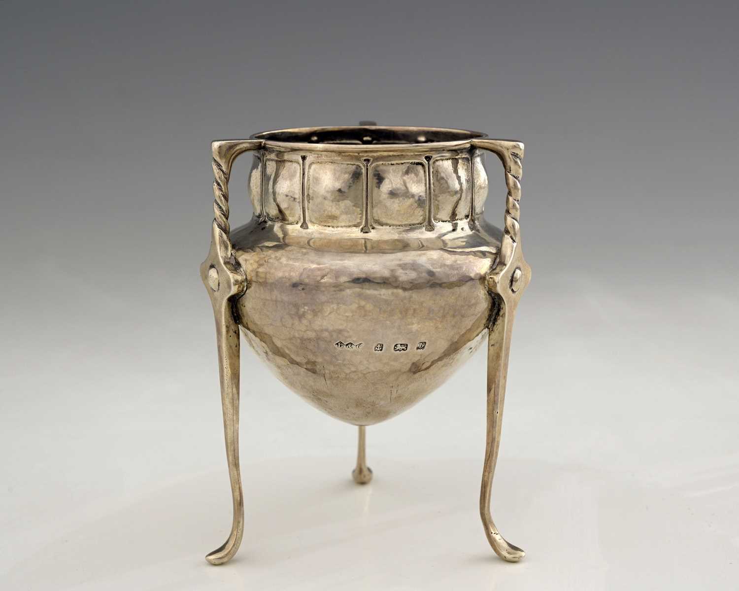 Lot 53 - Oliver Baker for Liberty and Co., a Cymric...