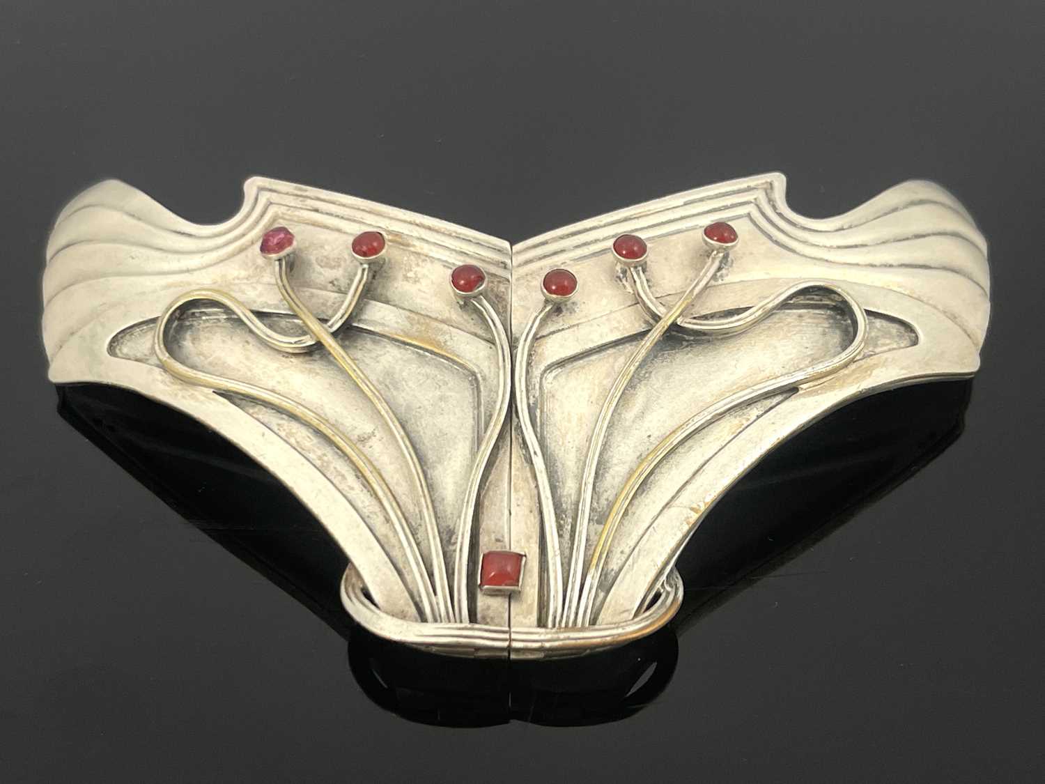 Lot 311 - A Secessionist silver plated and gem set...