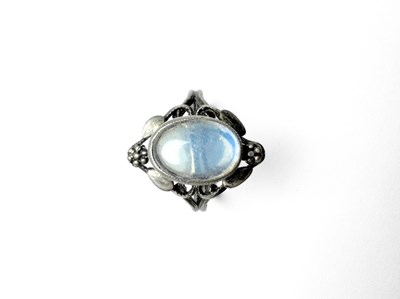 Lot 413 - An early 20th century white metal moonstone floral ring