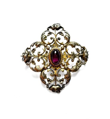 Lot 466 - An early 20th century whitel metal garnet openwork brooch