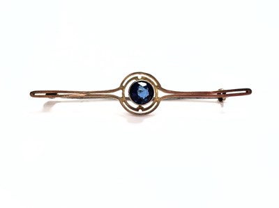 Lot 467 - An early 20th century 9ct gold blue paste bar brooch