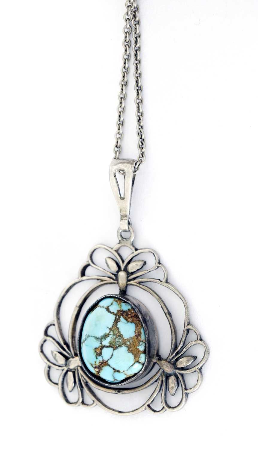 Lot 34 - Liberty & Co., an Arts & Crafts silver turquoise pendant, with chain