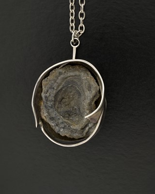Lot 39 - Graham Watling, a mid 20th century silver geode brutalist pendant, with chain