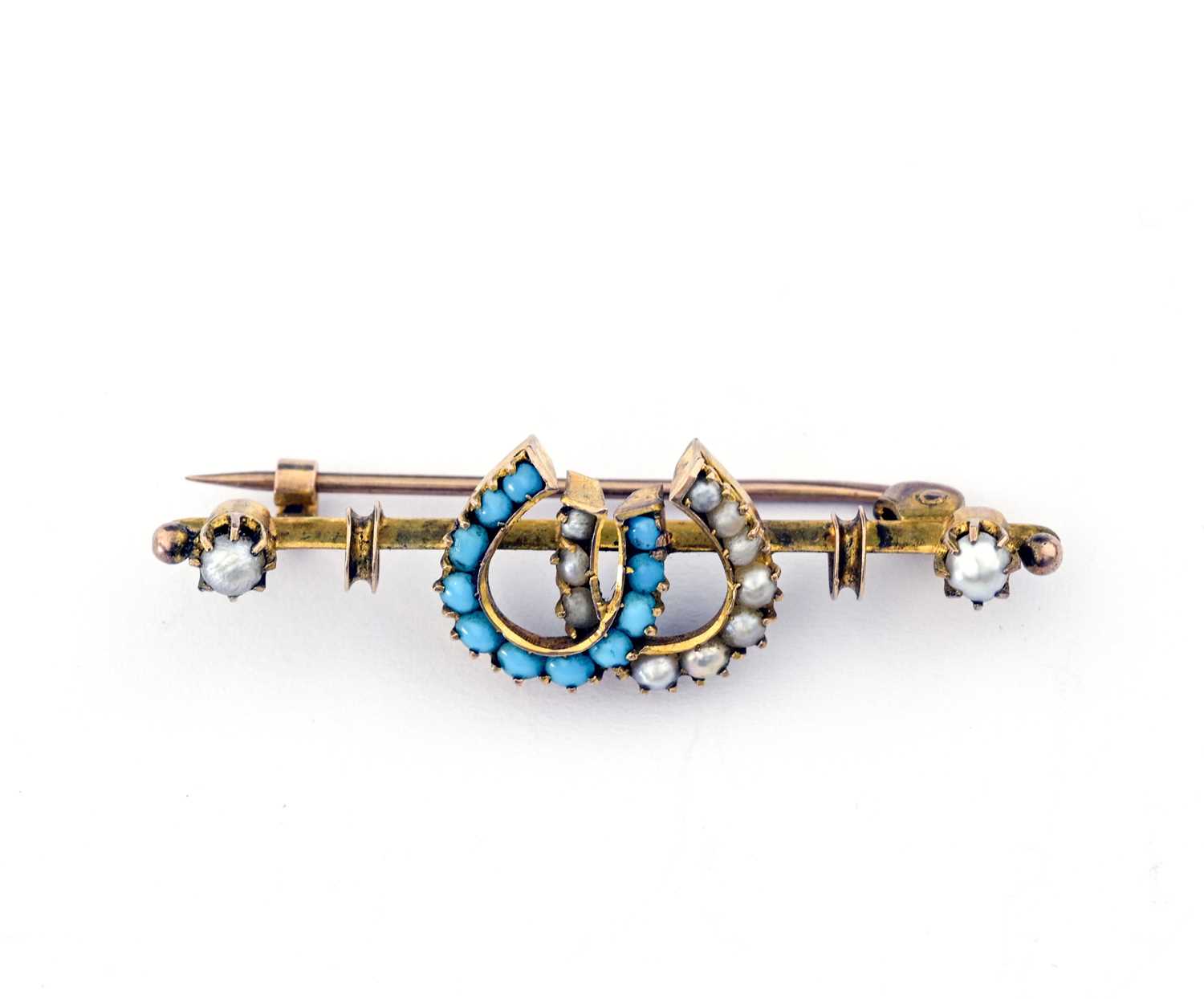 Lot 28 - Murrle Bennett & Co., an early 20th century 9ct gold turquoise and pearl horseshoe bar brooch