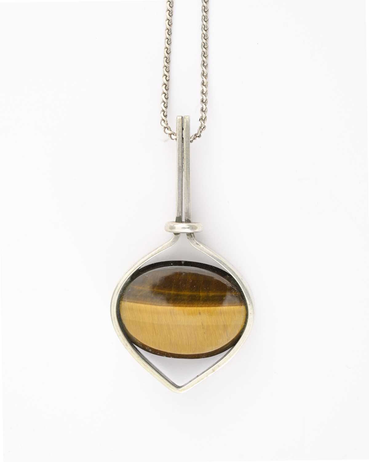 Lot 38 - Kupitaan Kulta Oy, Finland, a modernist silver tiger's eye pendant, with chain