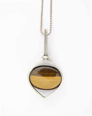 Lot 38 - Kupitaan Kulta Oy, Finland, a modernist silver tiger's eye pendant, with chain