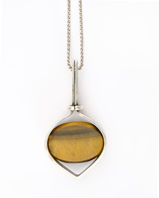 Lot 38 - Kupitaan Kulta Oy, Finland, a modernist silver tiger's eye pendant, with chain