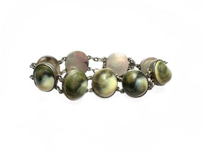 Lot 476 - A mid 20th century silver operculum shell bracelet