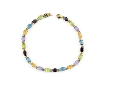 Lot 5 - A 9ct gold harlequin multi-gem line bracelet