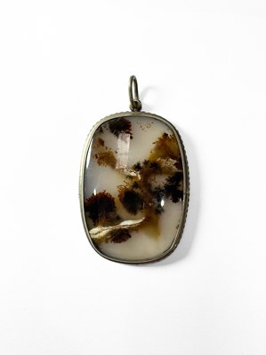 Lot 473 - A mid 20th century white metal moss agate pendant