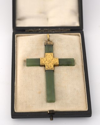 Lot 6 - An early 20th century gold mounted nephrite jade cross pendant
