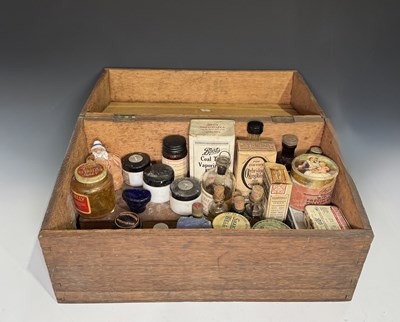 Lot 287A - An early 20thC oak medicine chest containing...
