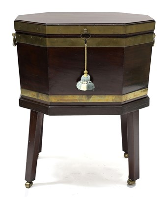 Lot 367 - A George III mahogany brass-bound cellarette...