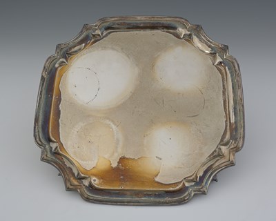 Lot 386 - An Elizabeth II silver salver, modelled in the...