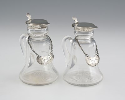 Lot 21 - Asprey, a pair of George VI silver-mounted...