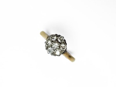 Lot 419 - An 18ct gold diamond floral cluster ring