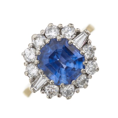 Lot 48 - An 18ct gold and platinum sapphire and diamond cluster ring