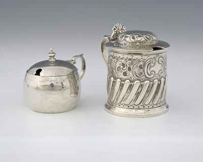Lot 333 - Two Victorian silver mustard pots, to include...