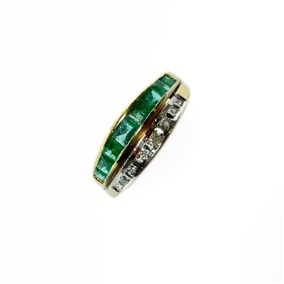 Lot 428 - A 14ct gold emerald and diamond dress ring