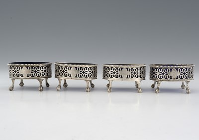 Lot 382 - A set of four George III Neoclassical silver...