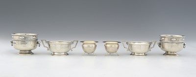 Lot 108 - Three pairs of silver salts, the larger...