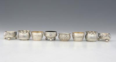Lot 406 - A group of eight hallmarked silver salts, to...