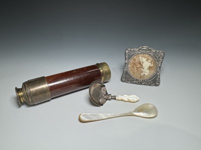 Lot 254 - A George III silver and mother-of-pearl tea...