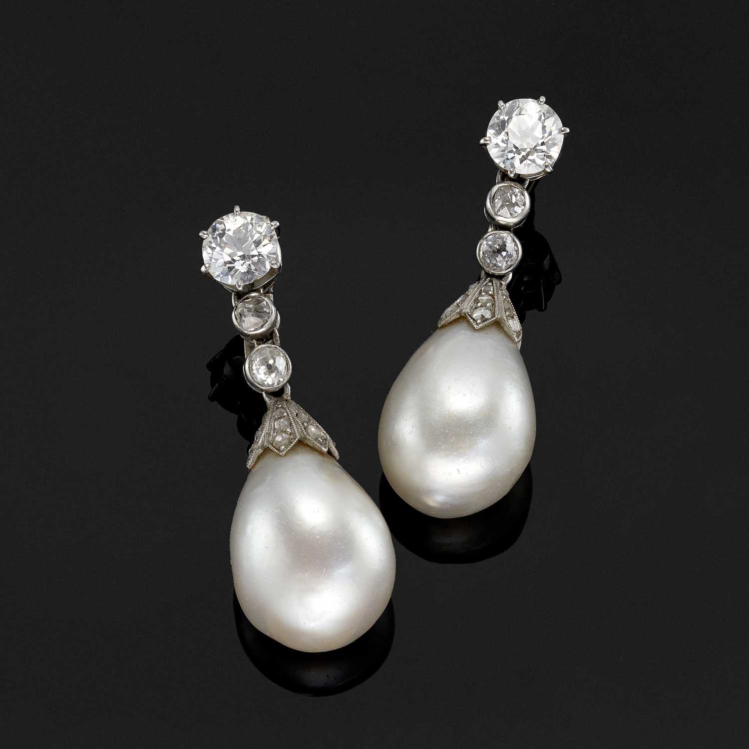 45 - An exceptional pair of Belle Epoque natural pearl and diamond drop earrings