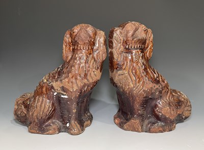 Lot 158 - A pair of terracotta or stoneware treacle...
