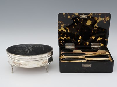 Lot 311 - A George V silver and tortoiseshell jewellery...