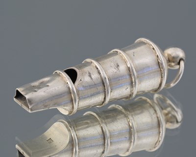 Lot 80 - A nineteenth-century silver whistle, with loop...