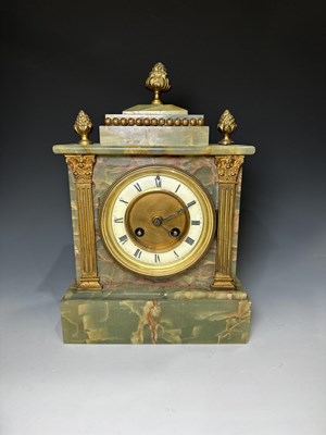 Lot 264 - Onyx gilt metal bracket clock with pine cone...