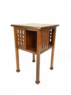 Lot 216 - Glasgow School, an Arts and Crafts oak book...