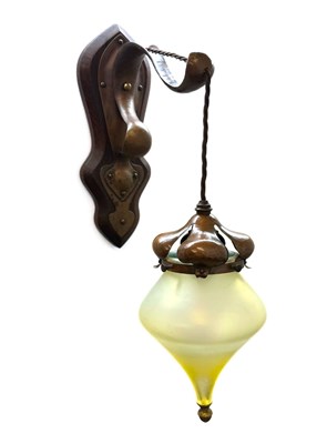 Lot 148 - An Arts and Crafts wall light bracket light,...