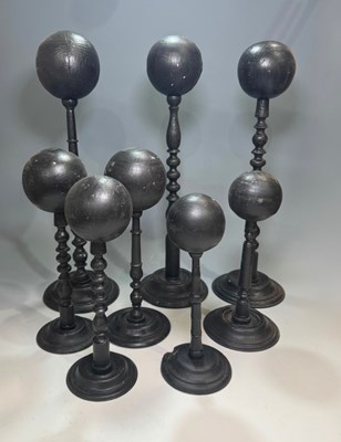Lot 212 - A small quantity of black painted, turned...