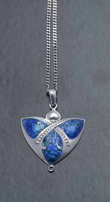 Lot 71 - An Art Nouveau silver pendant with later chain